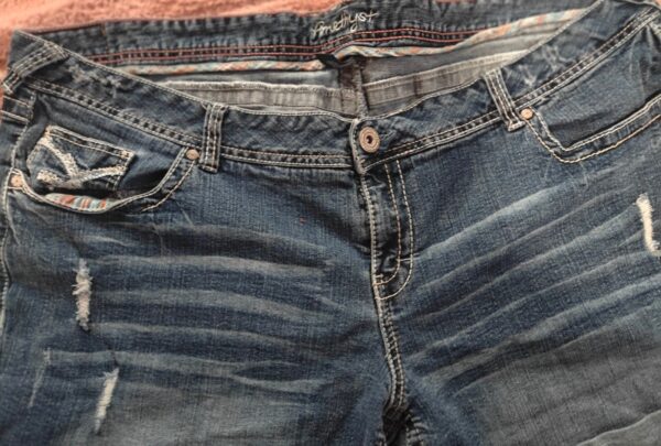 Two pair of shorts size 24, and a red shirt size extra extra large - Image 4